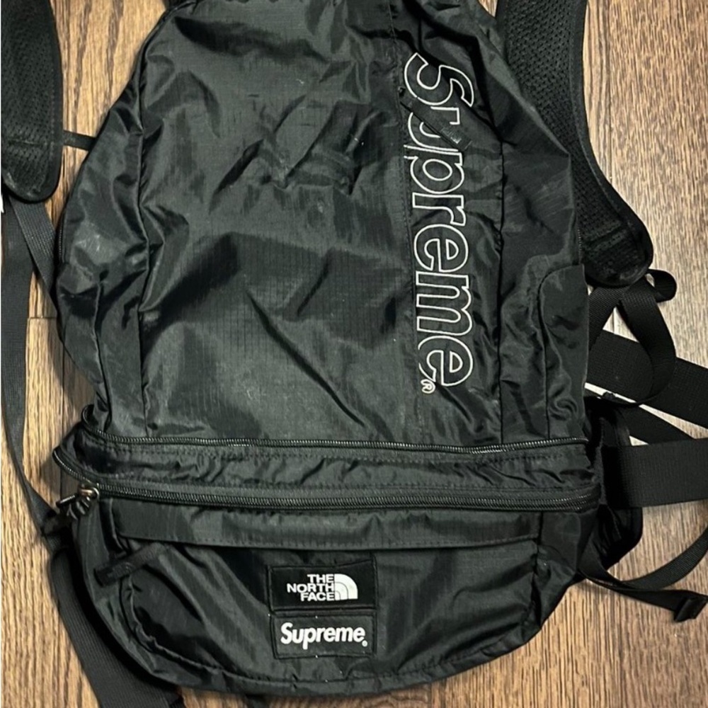 The North Face x Supreme Black Backpack that can turn into a shoulder/waist bag